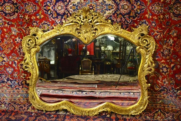 This is hand carved  gilt wood mirror. 