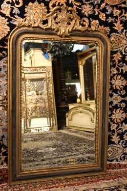 This is a very nice tall mirror with detailed crested frame. 