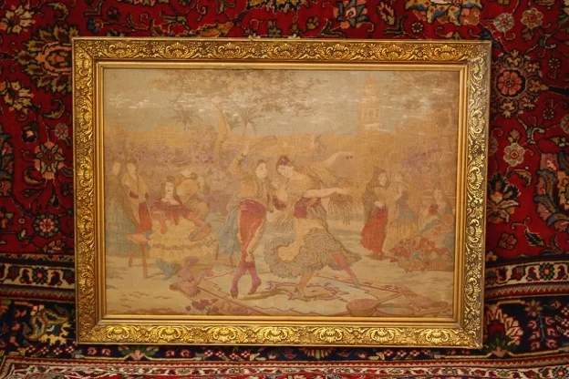 This is a nice old tapestry depicting dancers 