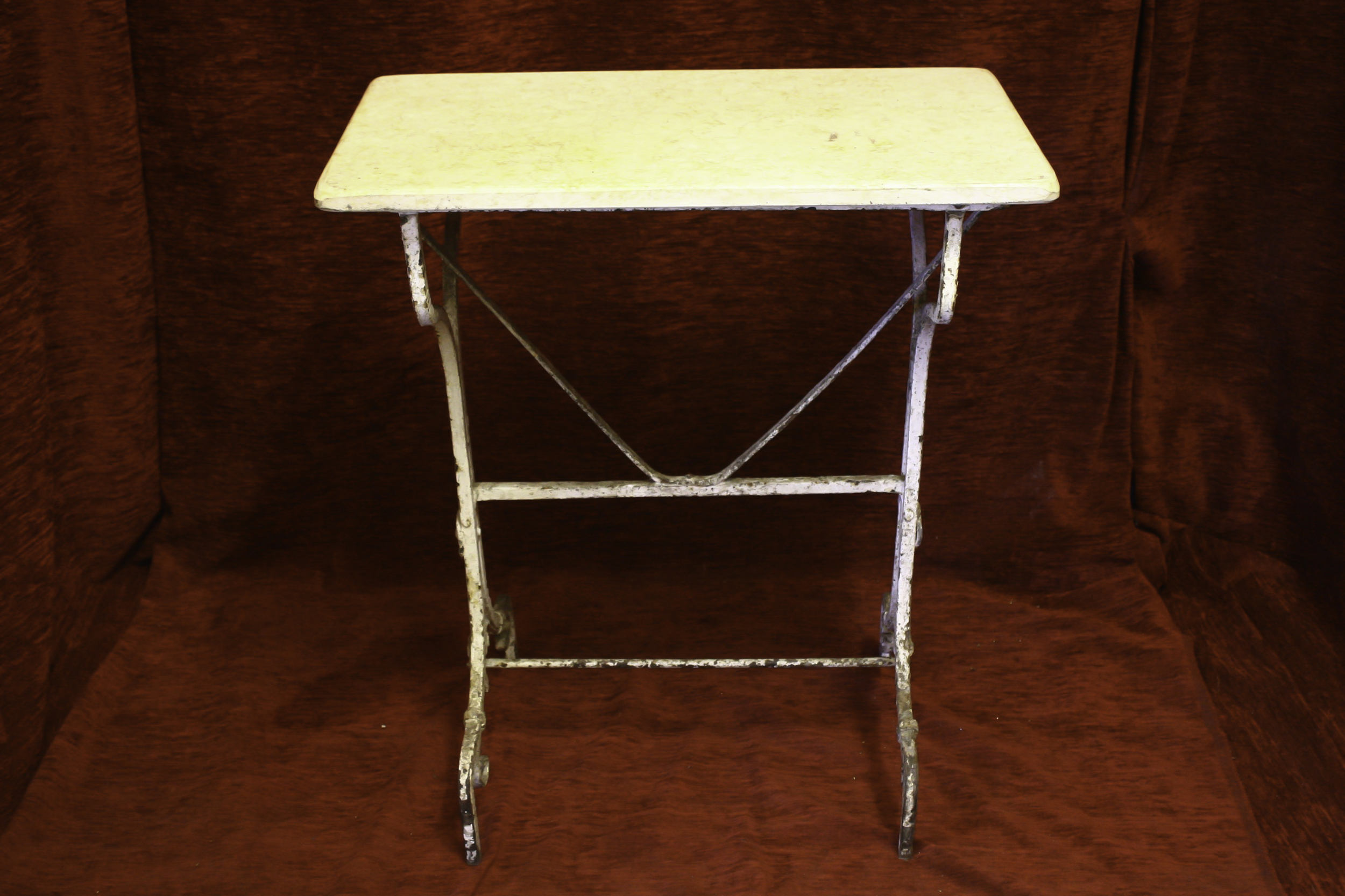This is an old wrought Iron table