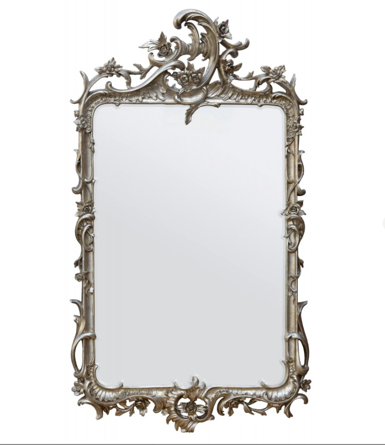 This is a medium silver ornate mirror