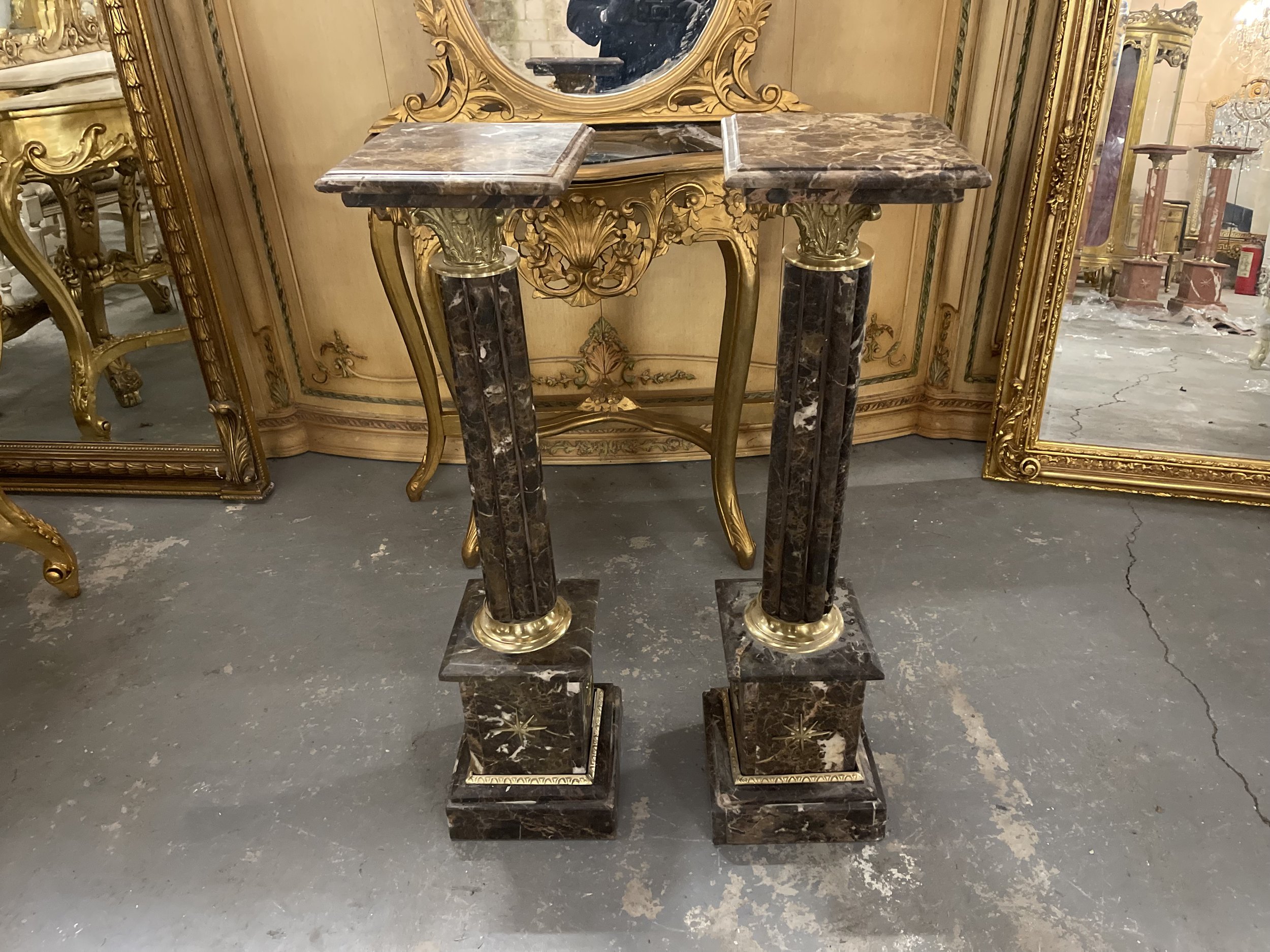 Marble pillars with brass detail