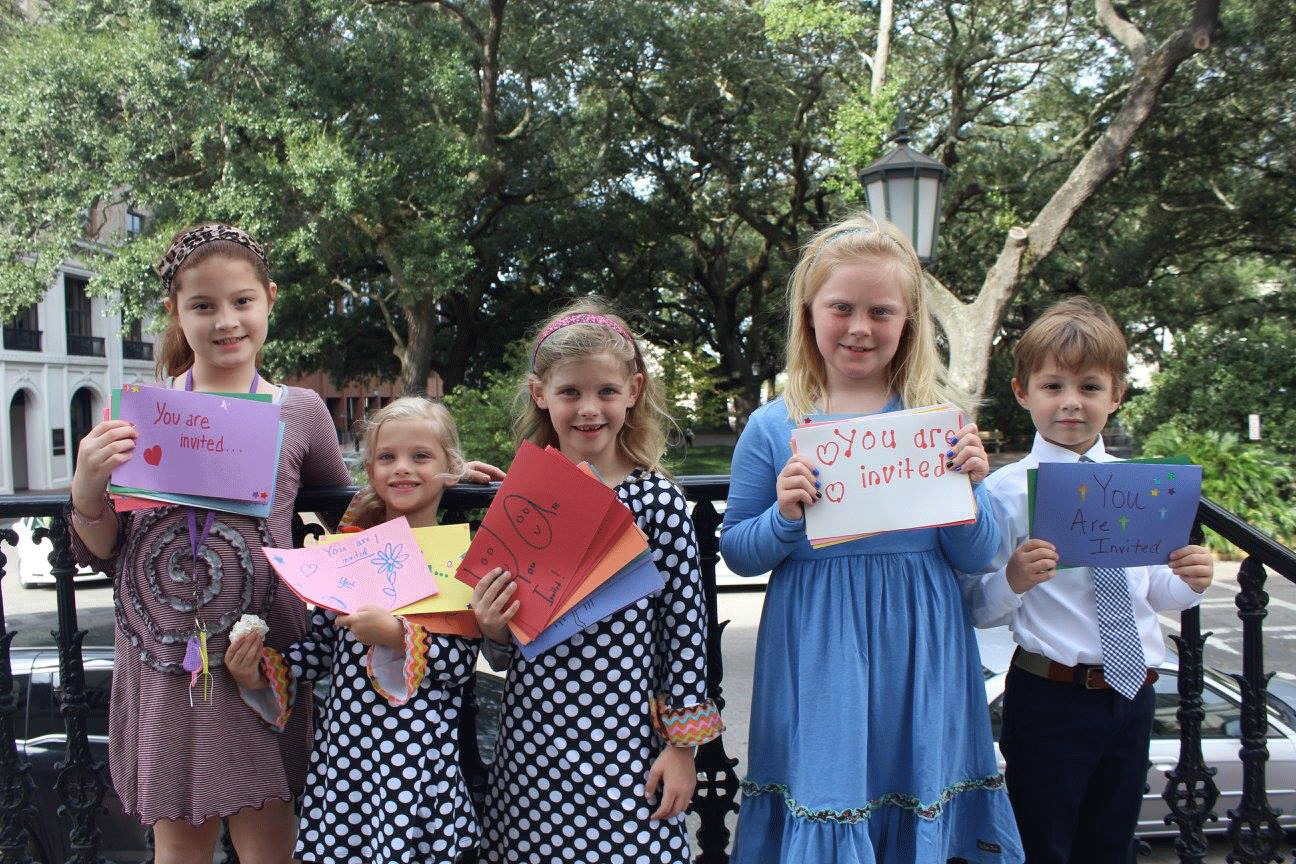 Children inviting parishioners to Empty Bowl, a fundraiser held in November to support Emmaus House. 
