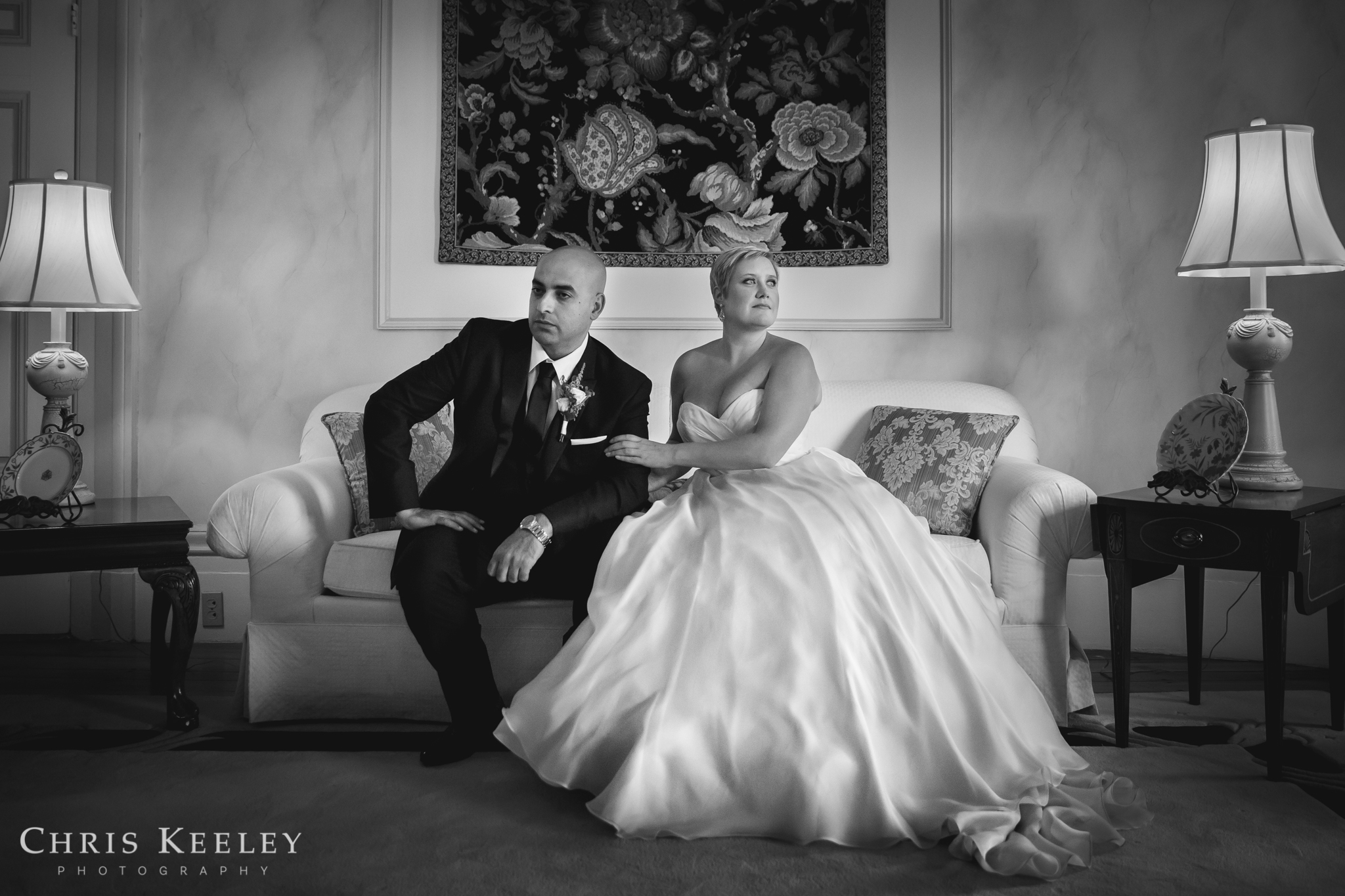 For her own surprise wedding, Renee chose an elegant Martina Liana strapless gown with a sweetheart ruched bodice, natural waist, and flowing silk a-line skirt. She also added a full ball gown petticoat under the skirt for added drama.