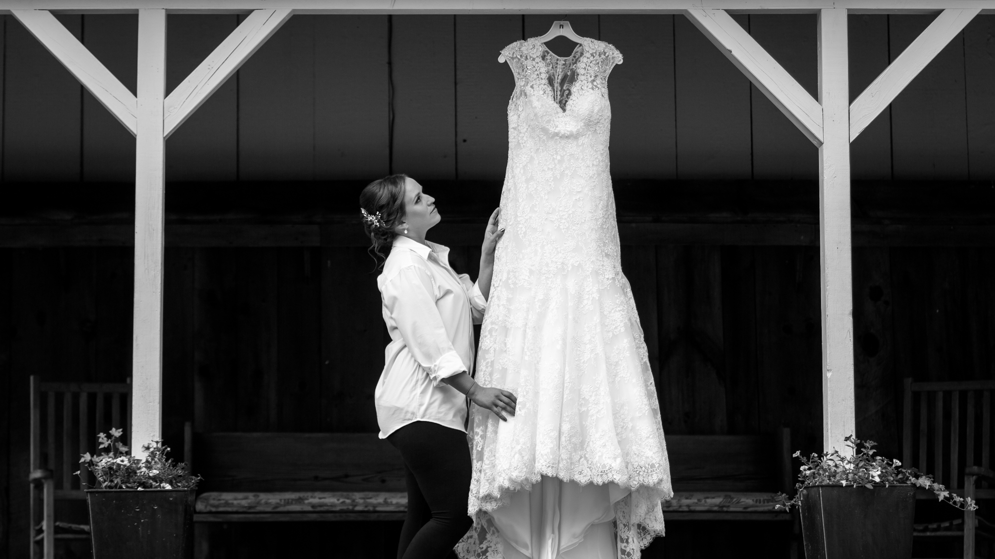 During the Getting Ready stage of your day, we select visually compelling backdrops with great light to record natural-looking moments, such as you with your dress.