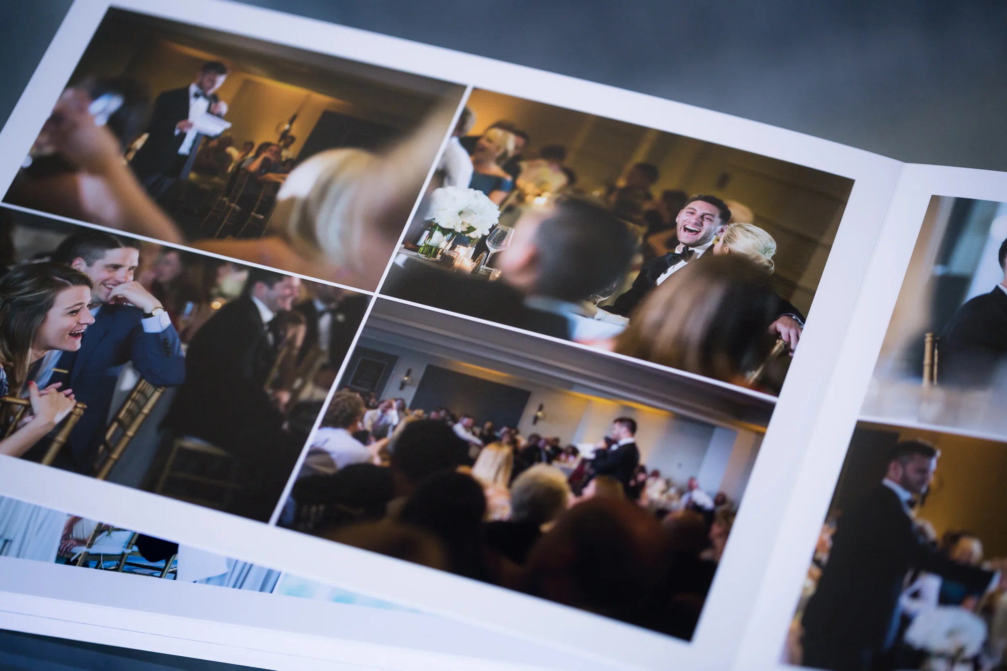 A wedding album showing the toasts at a Cliff House, Maine wedding.