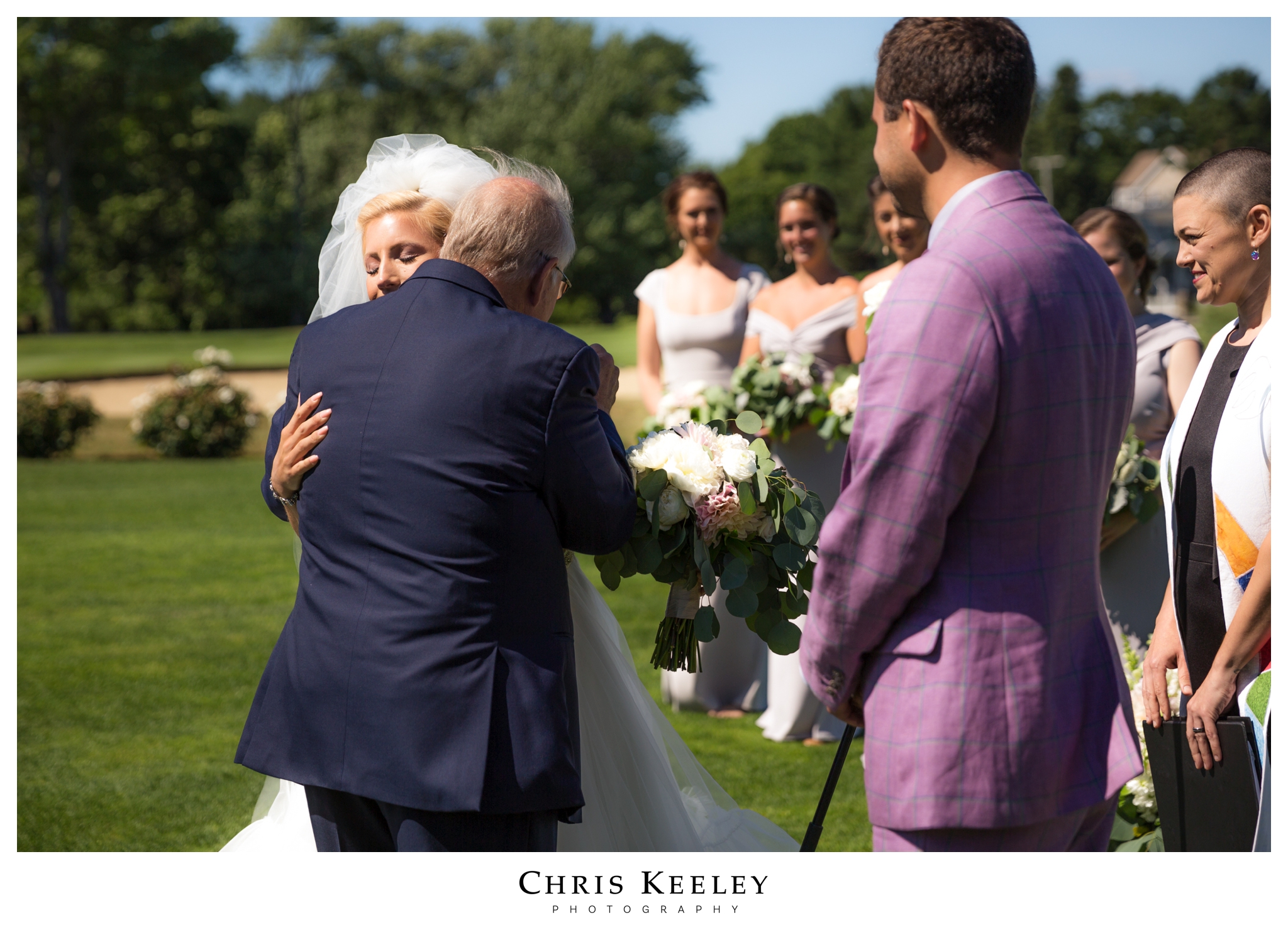 dad-hugs-daughter-at-ceremony.jpg