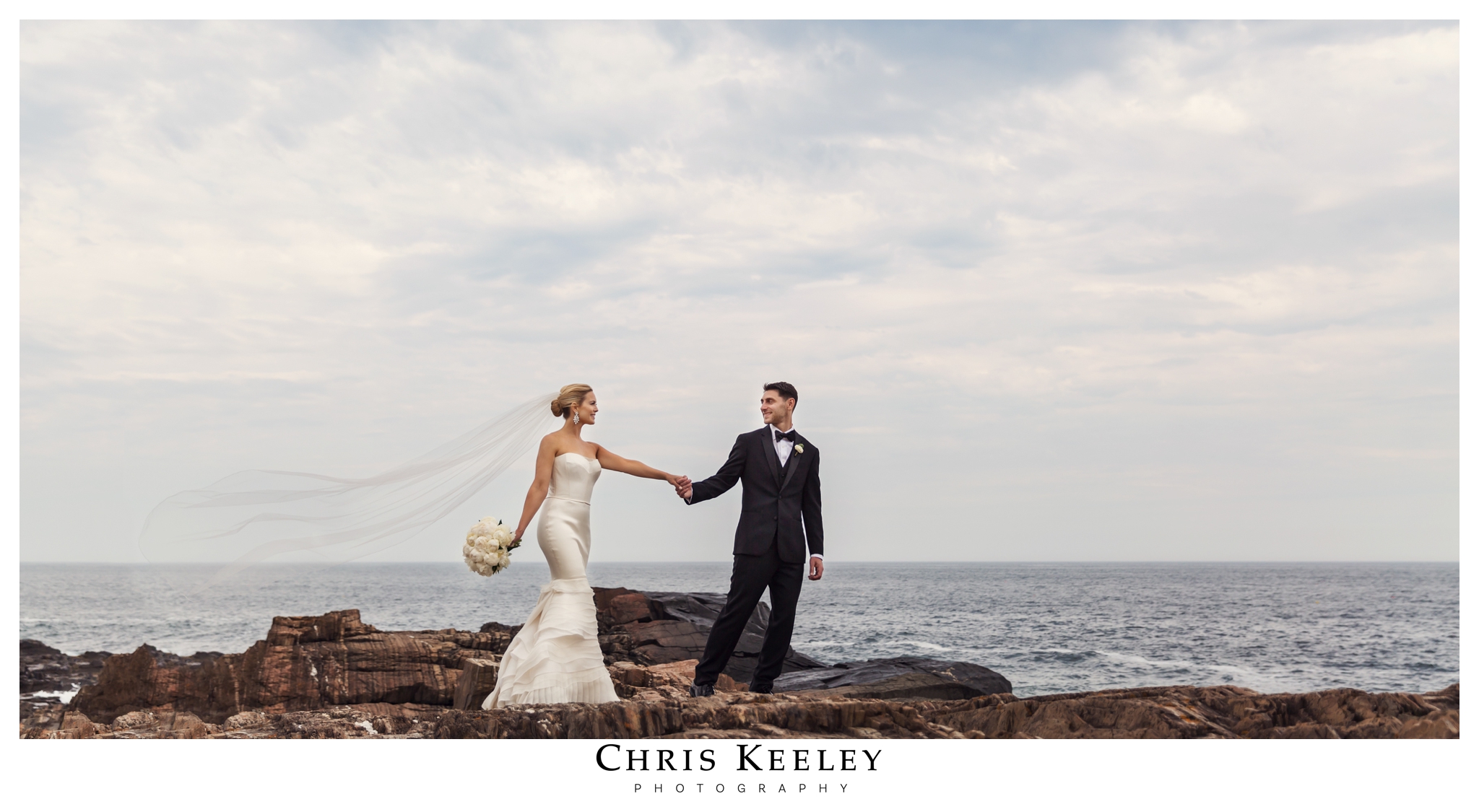 bride-groom-dramatic-pose-cliff-house.jpg