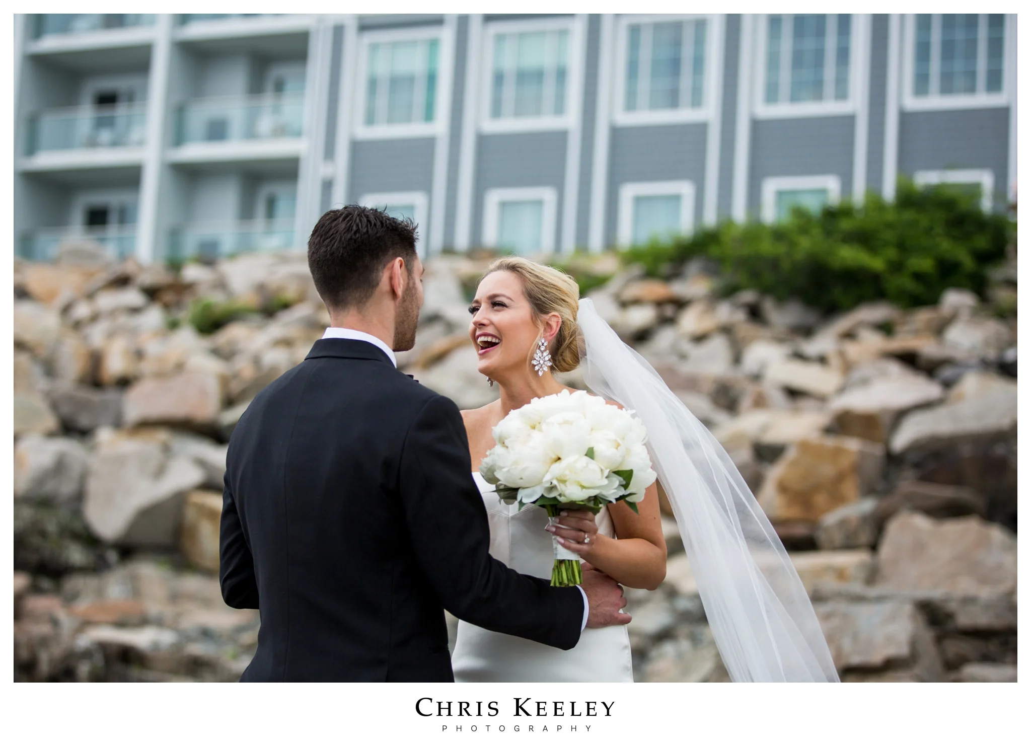 bride-smiling-at-groom-at-first-look.jpg