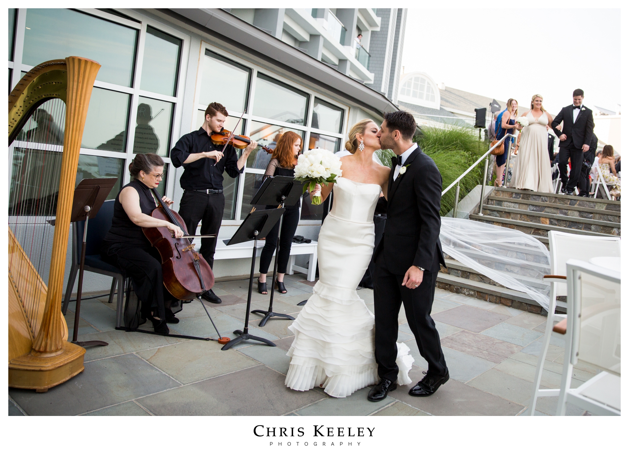 bride-groom-kissing-after-ceremony.jpg