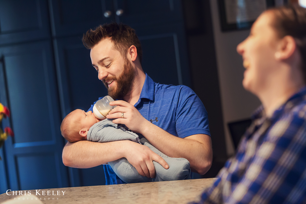 family-photos-father-holding-baby.jpg