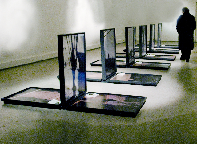 "Wordless" installation photos on metal 9 0X7 0m