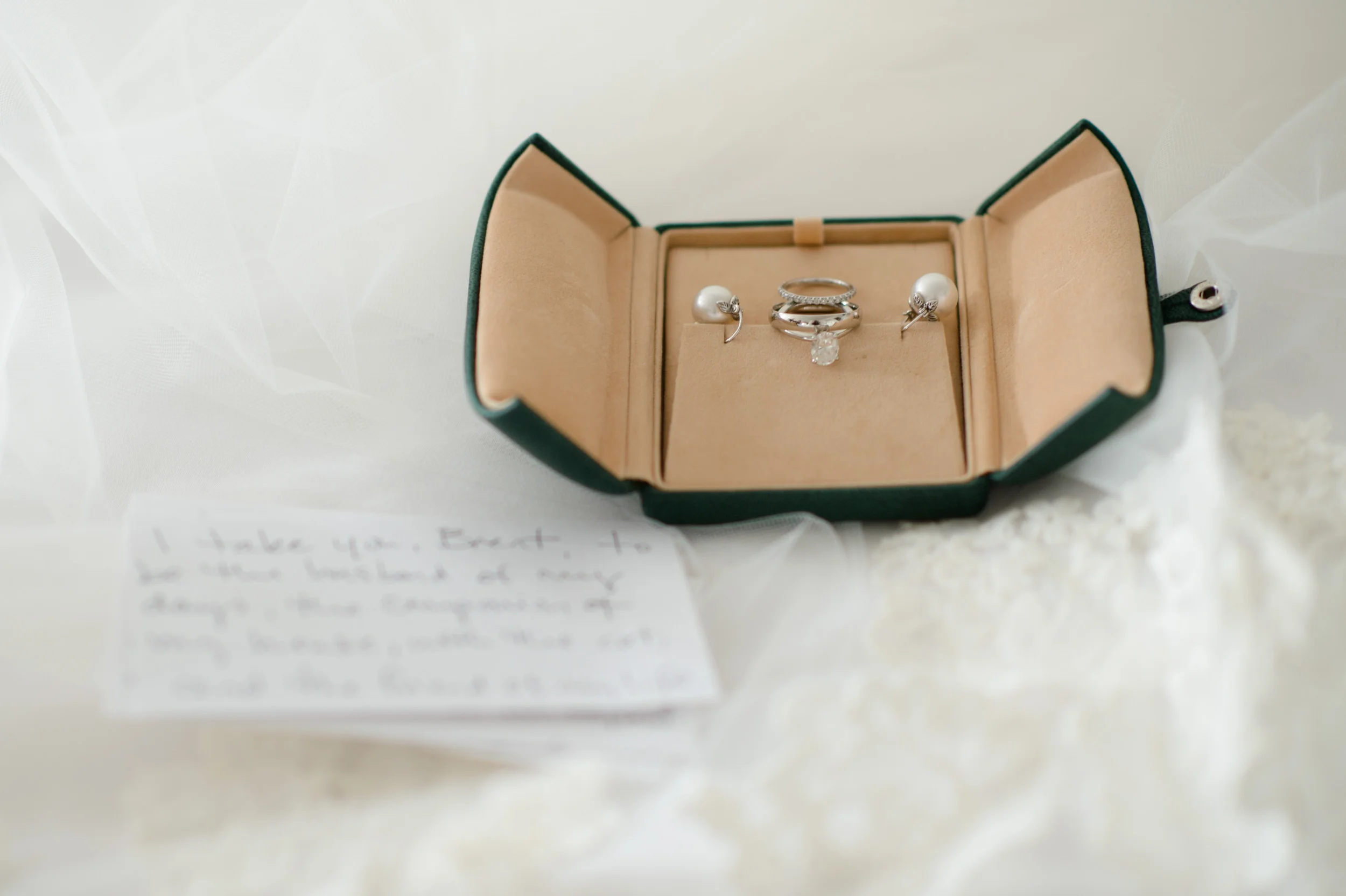 Wedding jewelry at Public Hotel Chicago before ceremony and reception at Cafe Brauer.
