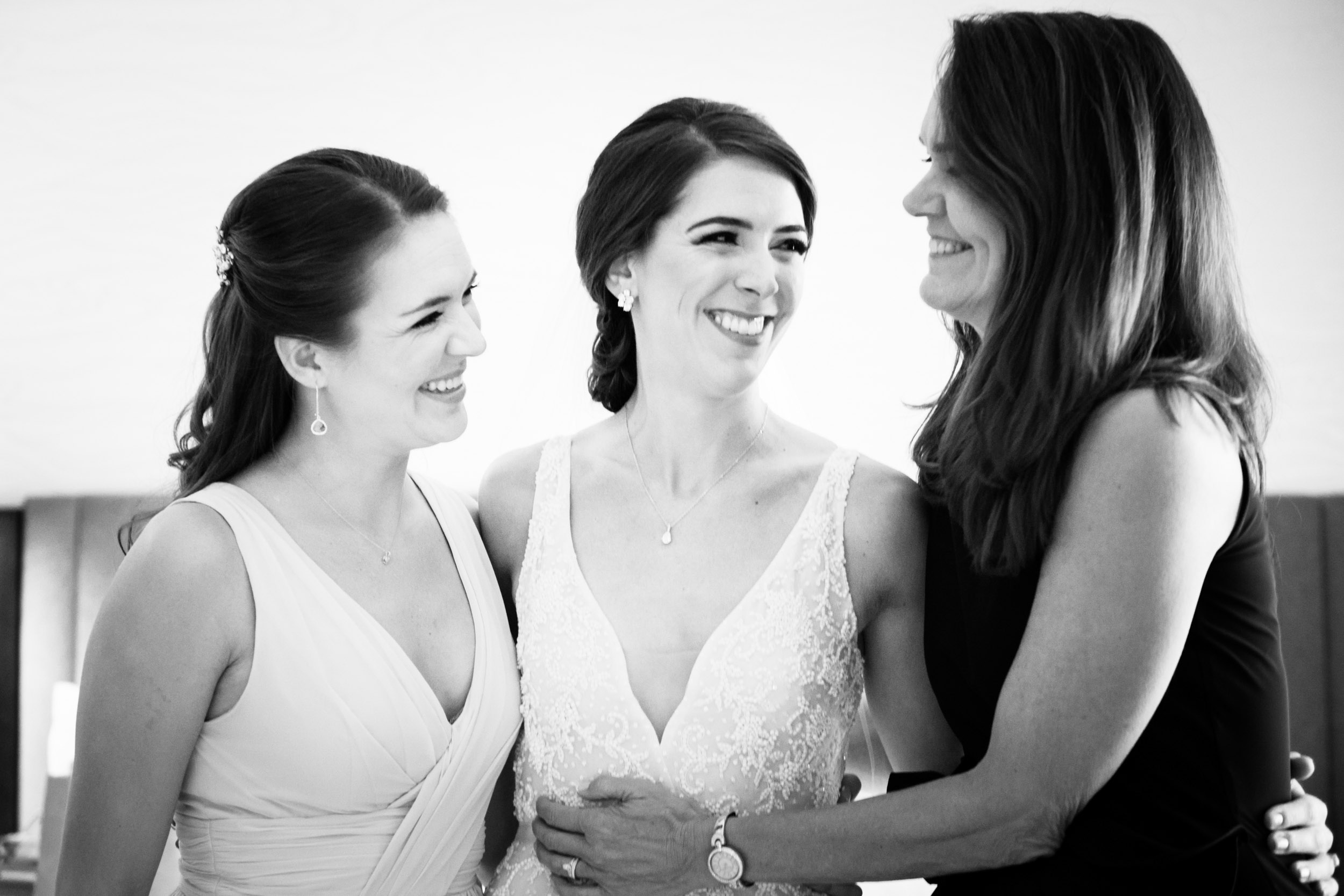 We love this candid photo of the bride and her family in the bridal suite at the Sheraton Grand in Chicago.