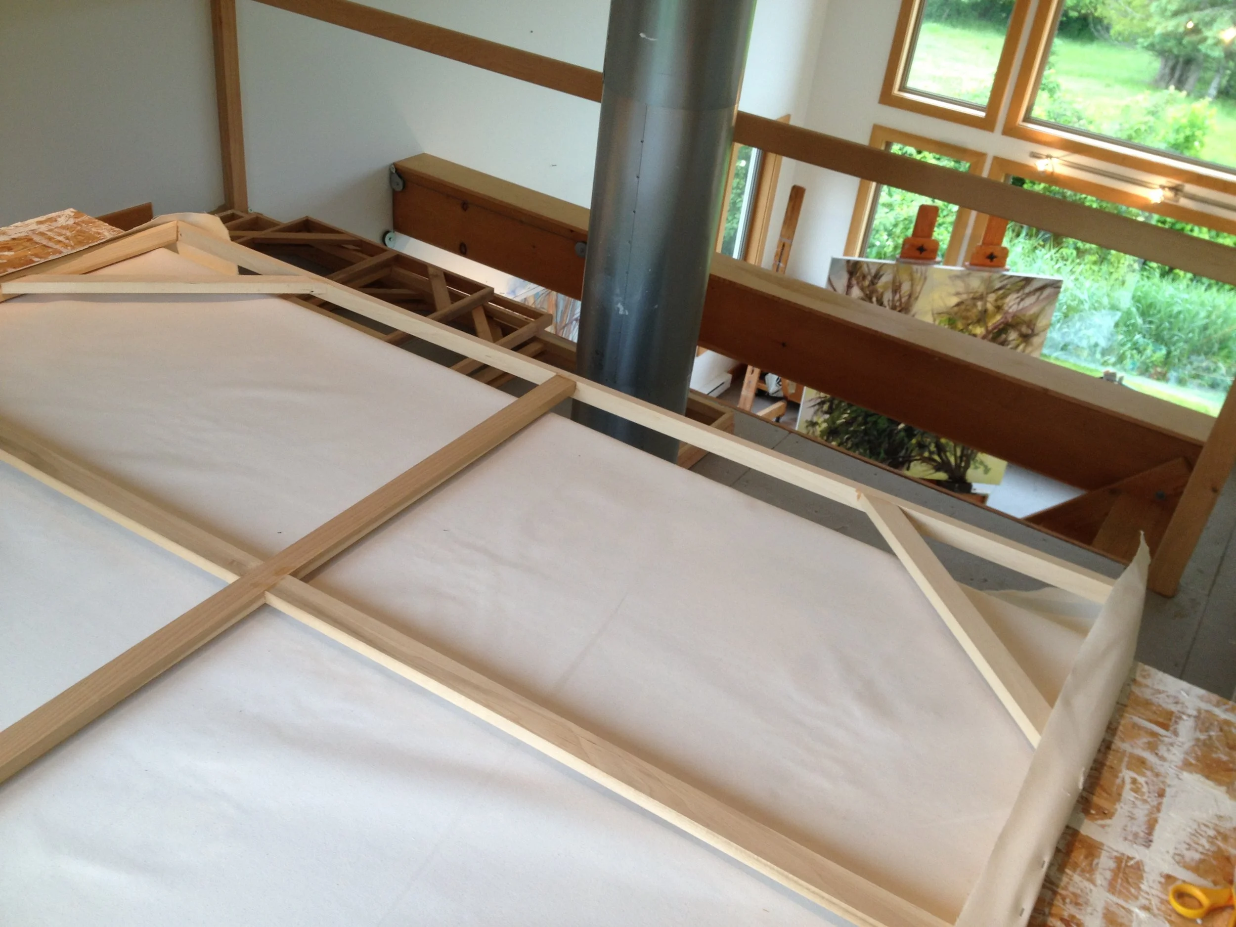 Studio loft area where I stretch and prime canvas