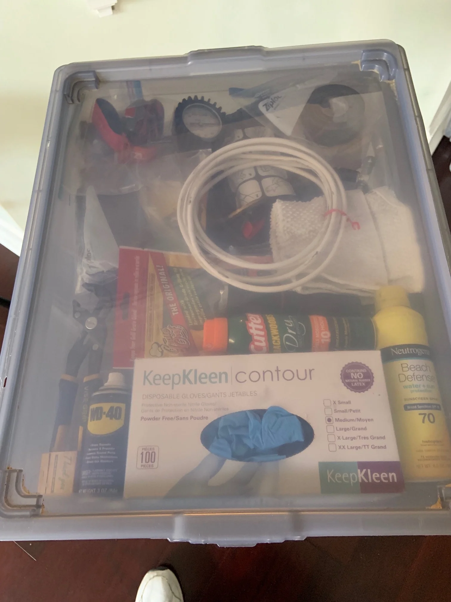First box nearly done, two things are here temporarily and a couple are missing. We do have extensive check lists to keep track. This is the shallow box that slides in a frame and is under the water hose, power cord, filter and electric surge protector.