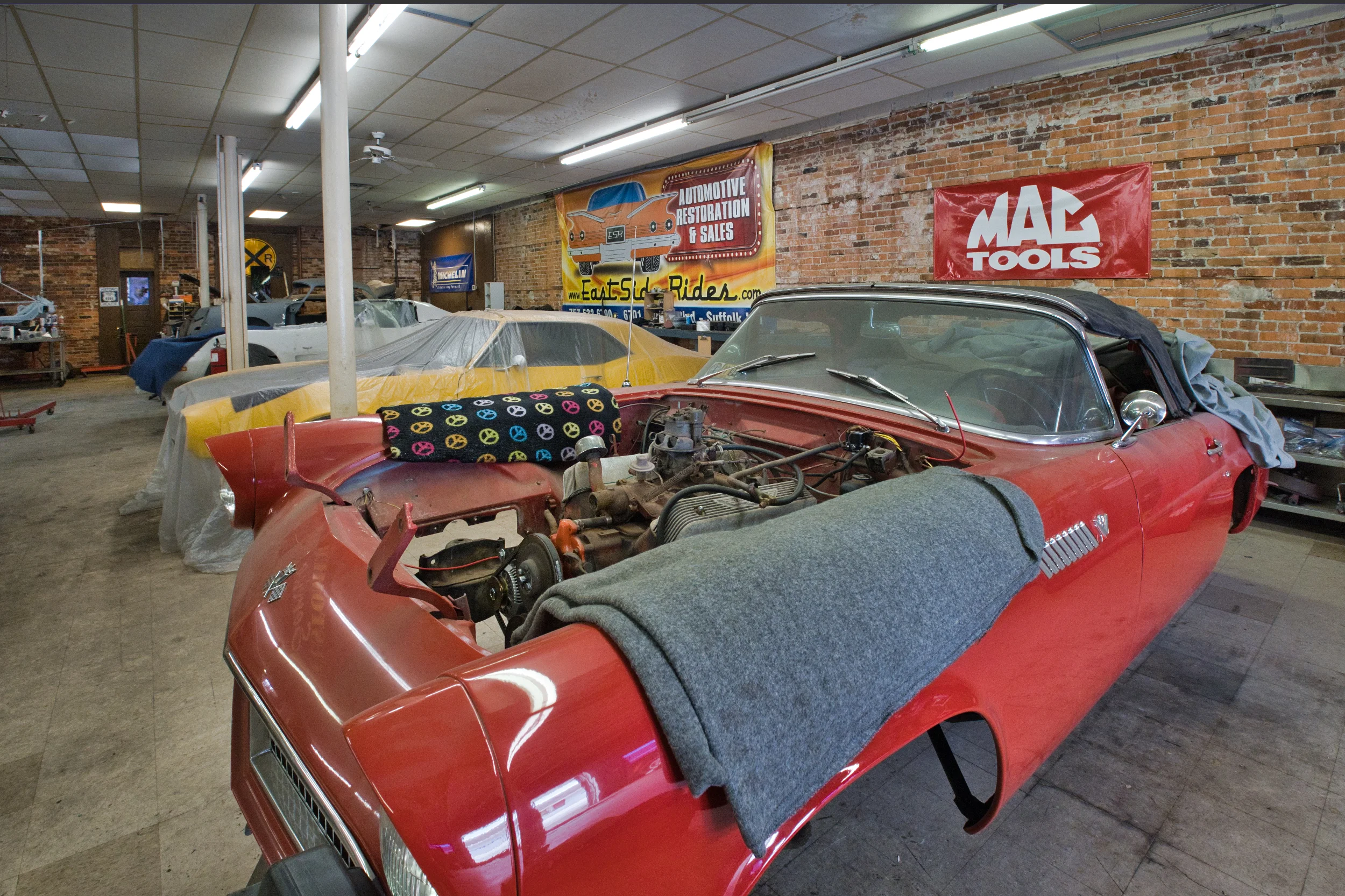 T-Bird up front, Camero, two Corvettes.