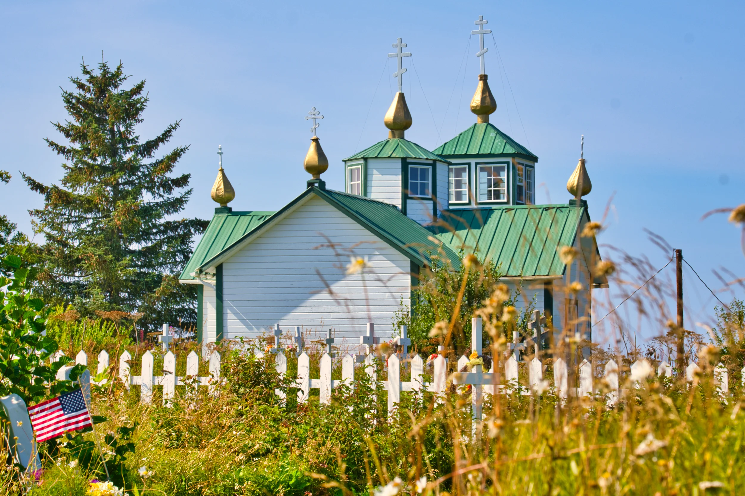 This is so neat, I am in the veterans section of their old graveyard and you can see the American flag, there were many, in the yard of the Russian Orthodox Church. A diverse nation.