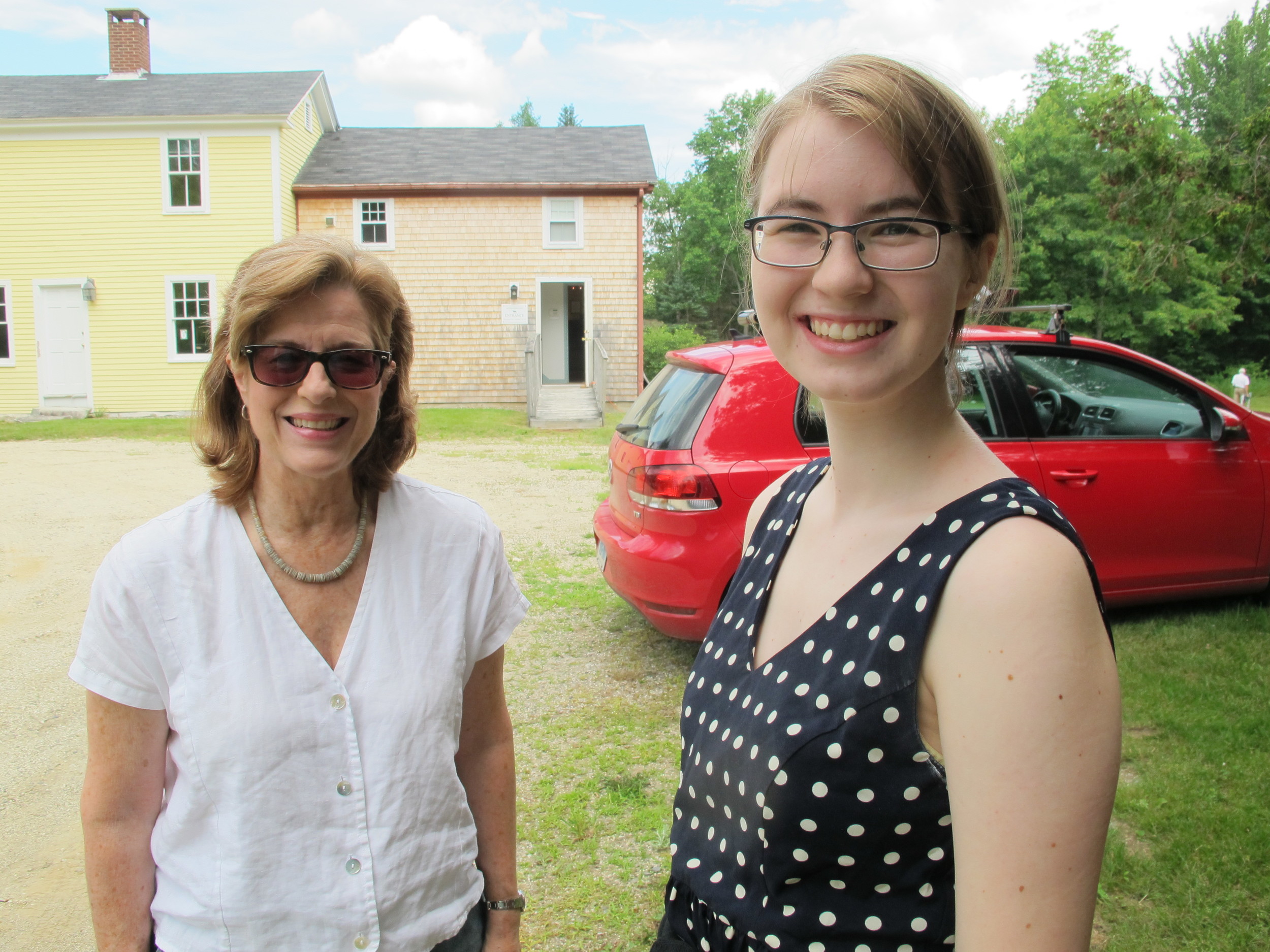 Jonathan Fisher house docent Judy and summer intern Samantha Curtis welcome those attending the symposium.