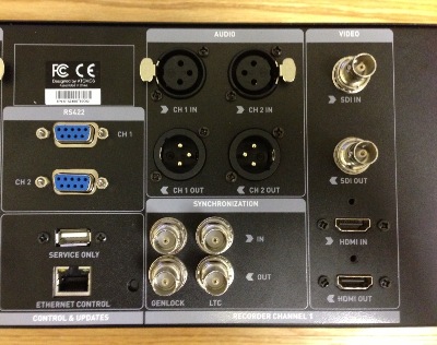 Close-up rear view detailing the various video and audio plus Genlock sync and LTC time-code connectors. RS422 and AMP remote control is possible via the included RS-422 and Ethernet ports. The Shogun Studio works with time-code from both HDMI and SDI sources. Recording can also be triggered by HDMI and SDI sources. 