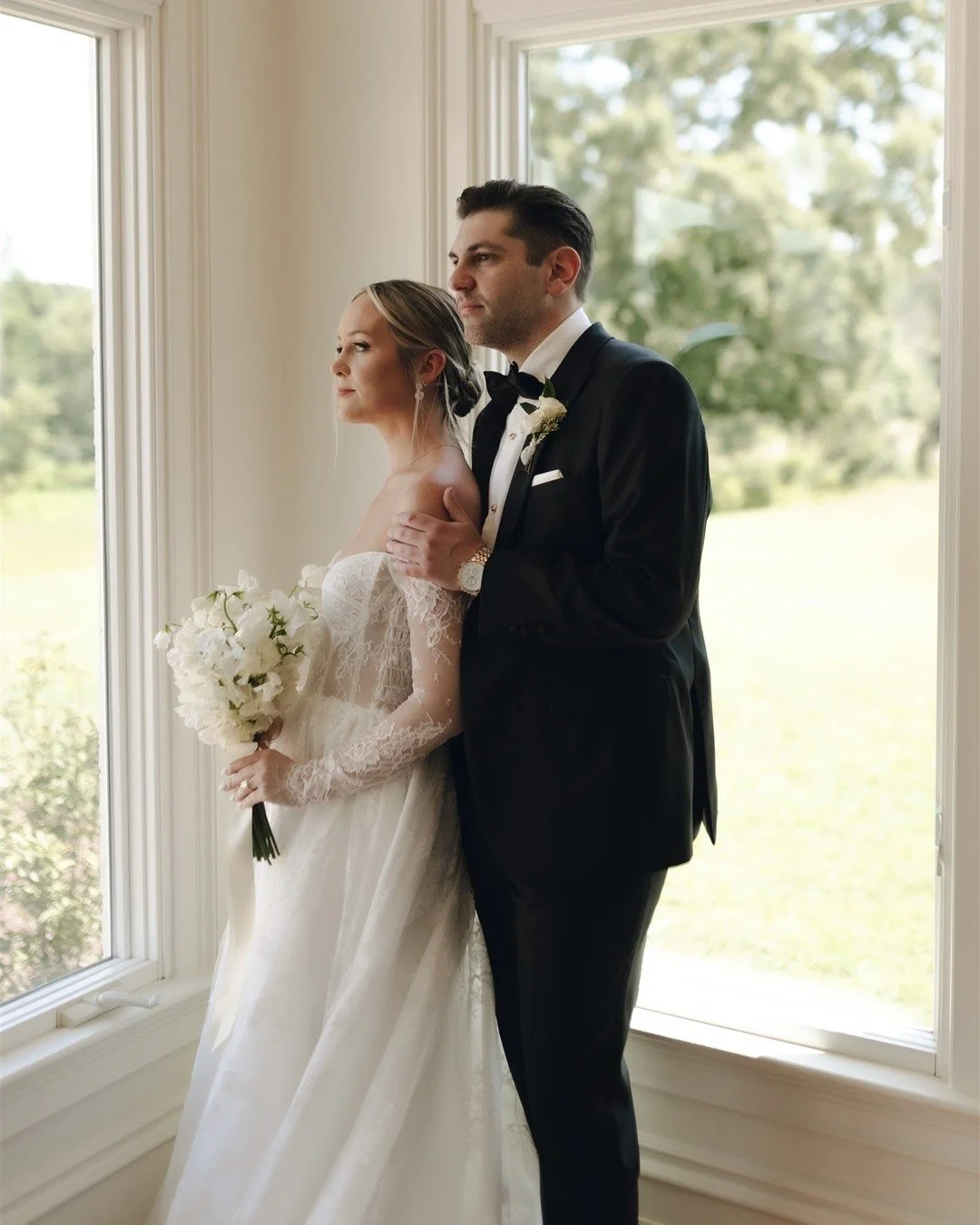 A study in timeless elegance &mdash; Rachel and Daniel exchanged vows at the stately Donovan Manor, where every detail exuded classic sophistication. Rachel&rsquo;s intricate @_houseofflora_ gown, finished with chic off-the-shoulder sleeves, set the 