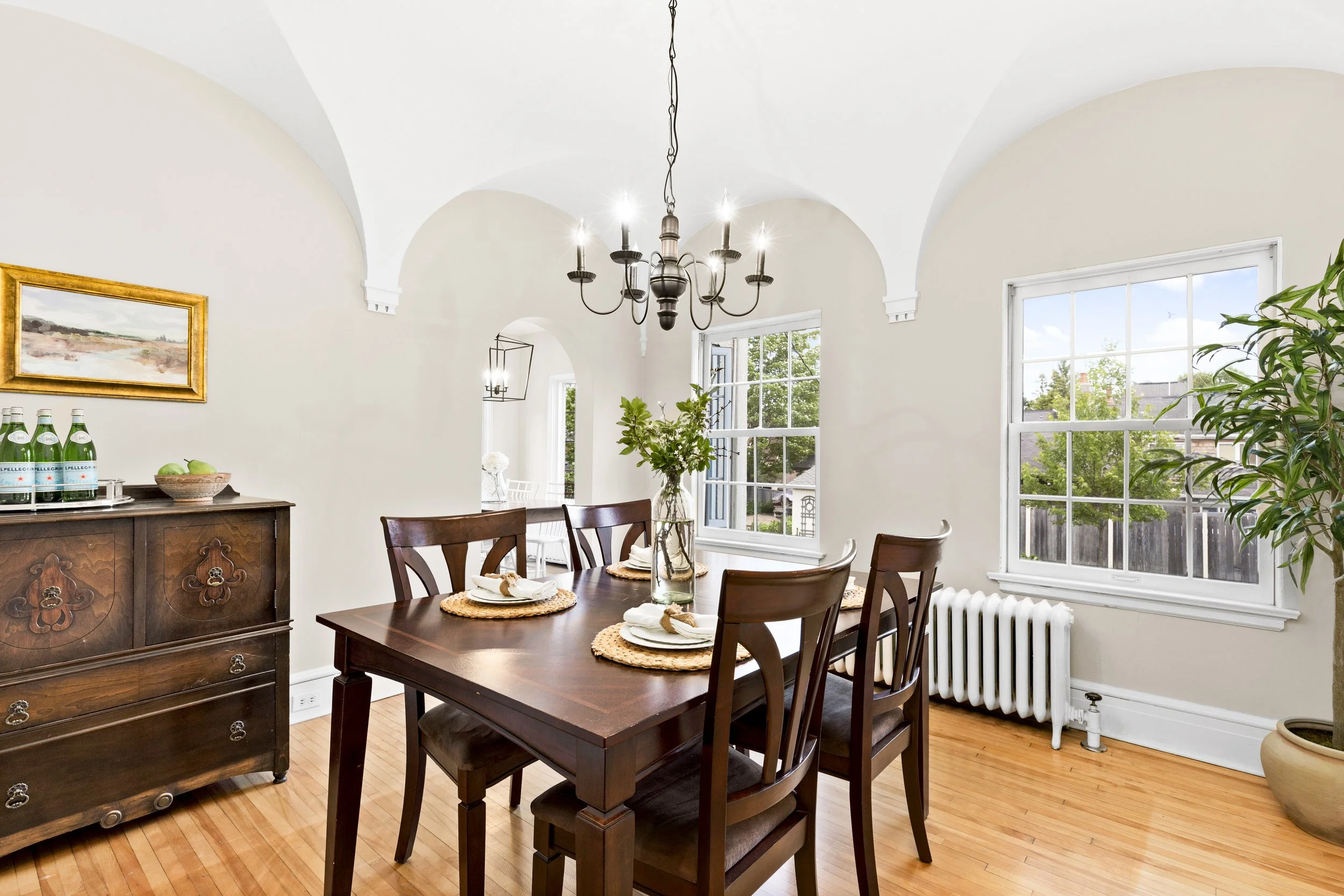 Bright and inviting dining room professionally photographed for a real estate listing in Duluth, Minnesota, by Tatiana Marie Photography.