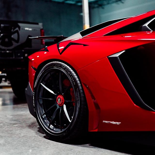 SuperVeloce | @Lamborghini Aventador SV sitting on the perfect set of 20/21&rdquo; A1-10 finished in Matte Black with Candy red hardware with Matte Carbon lips to finish off the perfect shoes for this Raging Bull | #AlphaOneWheels #KeepitA1
