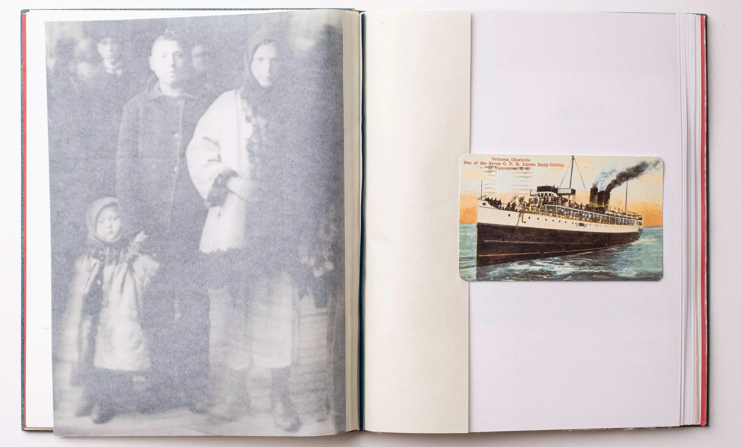 An open photo album with a black-and-white photograph of a woman and a young girl on the left page. The woman is standing, wearing a coat, and the girl is standing beside her. The right page contains a vintage illustrated postcard of a steamship with