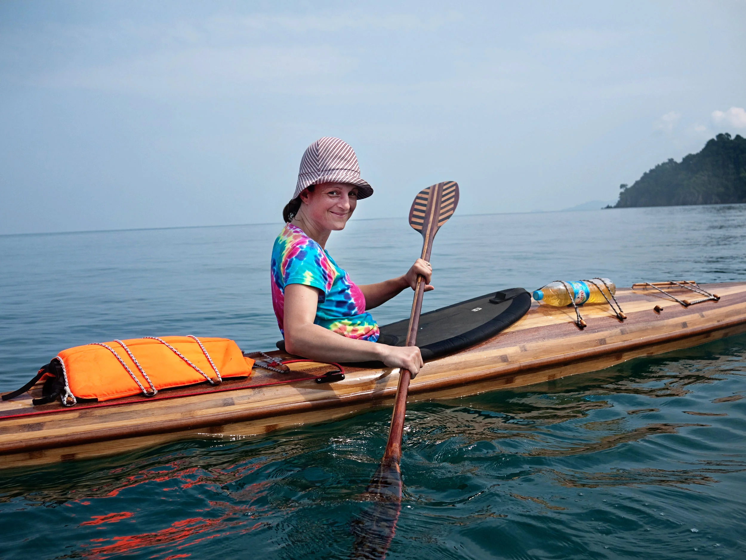This is me sea kayaking in Thailand. A half hour after this photo was taken, the sea got really rough, rain poured from the sky in big fat aggressive drops. Lightning struck all around and I feared for my life, but I survived and felt proud of my experience and strength in facing nature's power. 