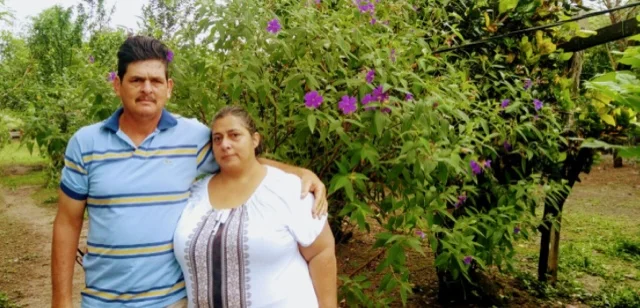This is Mr. Silian and Mrs. Lucy waiting for their chicken coop...