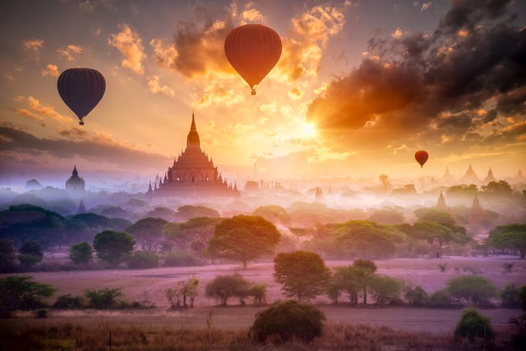 hot-air-balloon-over-plain-of-bagan-in-misty-morning--mandalay--myanmar-654557138-5b778220c9e77c0025a203b0.jpg