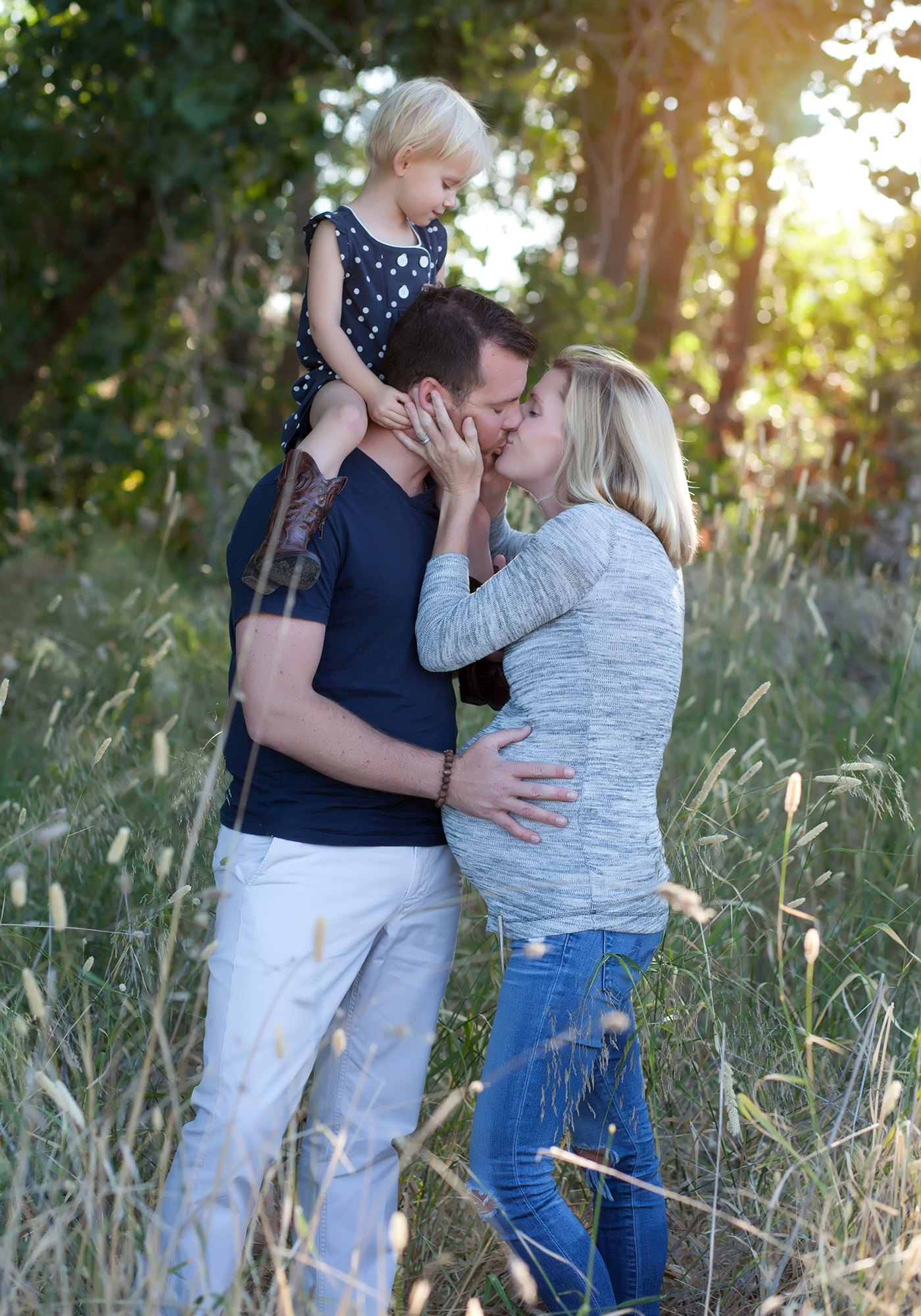 outdoor family portrait in tall grasses