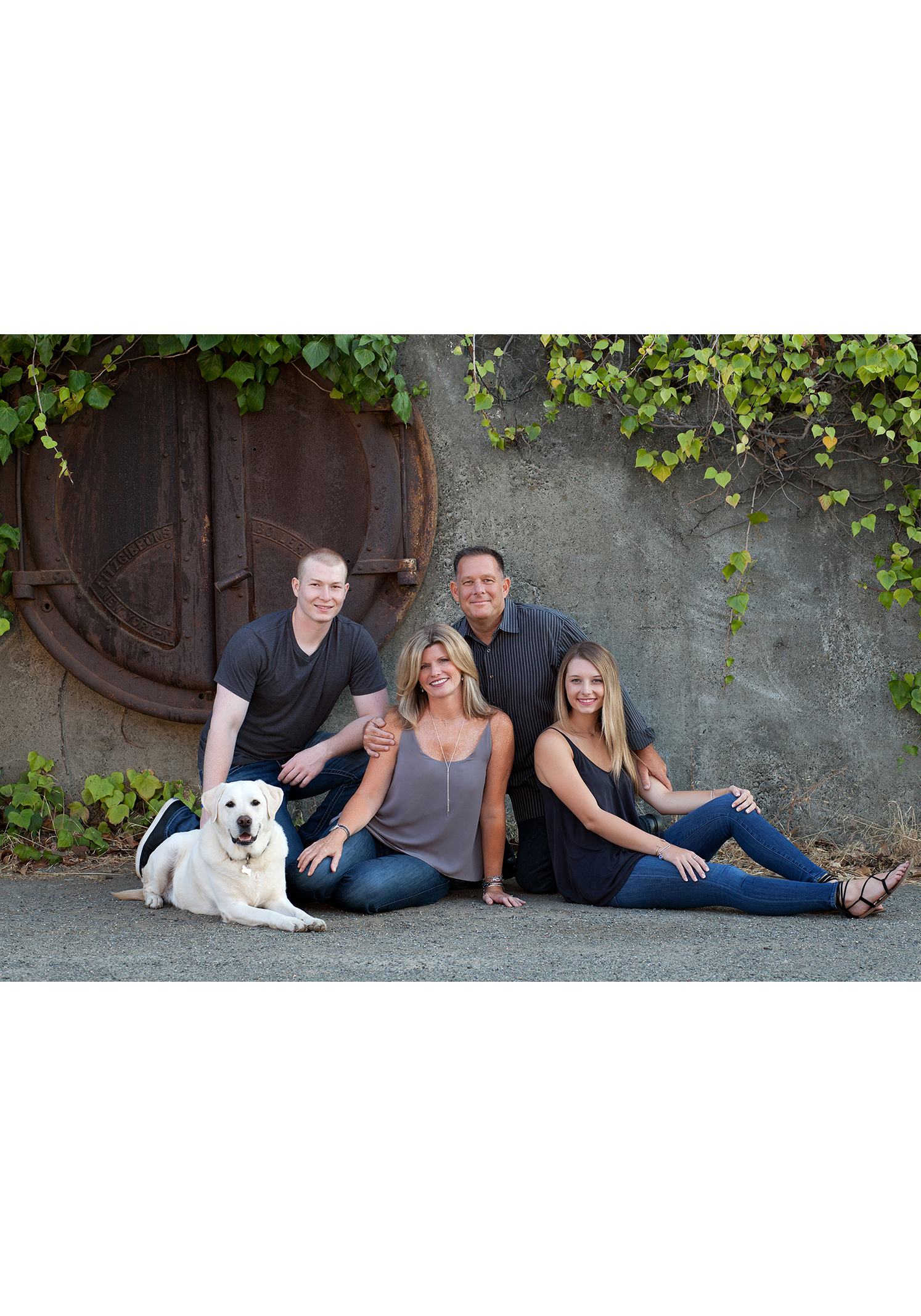 outdoor urban family portrait with dog