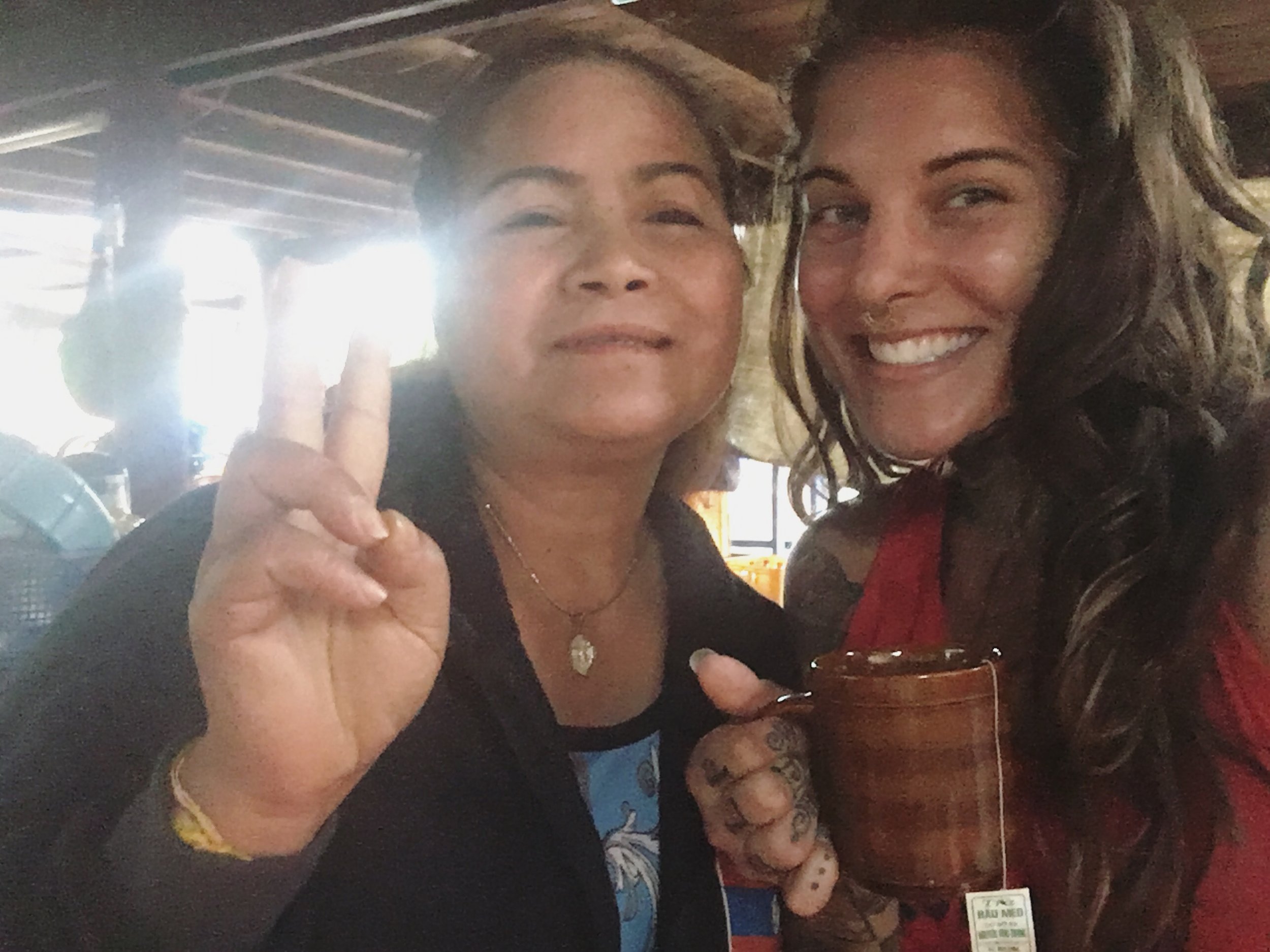 Laos locals are some of the kindest people I've met. We got caught in a storm while motorbiking on top of a mountain.. soaked and freezing. This lady and her family took care of us for a couple hours. A roof, fire, pork soup, sticky rice, tea and a lot of beer.