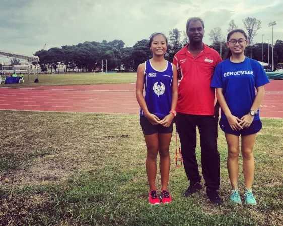 Coach Tanaball with walkers Dora and Shantel