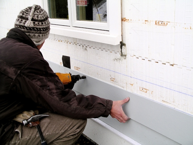 Fiber-cement siding attached to ICF web with pneumatic nailer