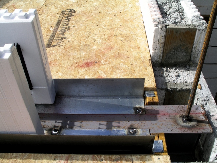 Channels welded to top of steel beam to receive ICFs