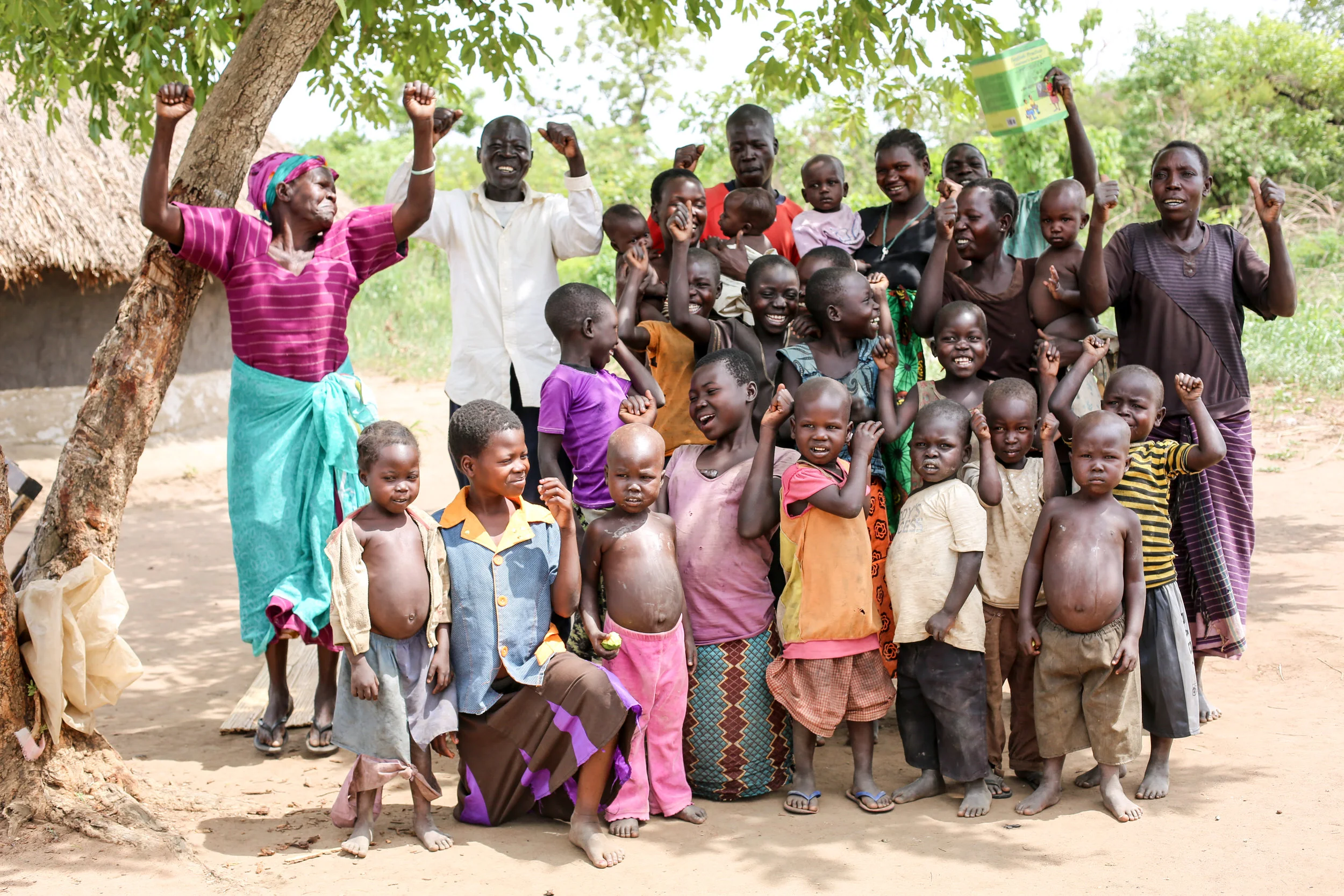 Kelementina and her dependents celebrating their resilience, their victories and IJM.