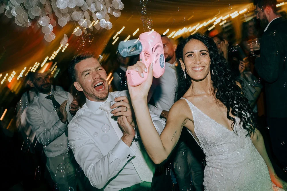 wedding-party-photographs-bubble-machine.webp