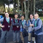 Newsies waiting for the bus to rehearsal