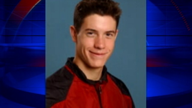 swim coach suspended