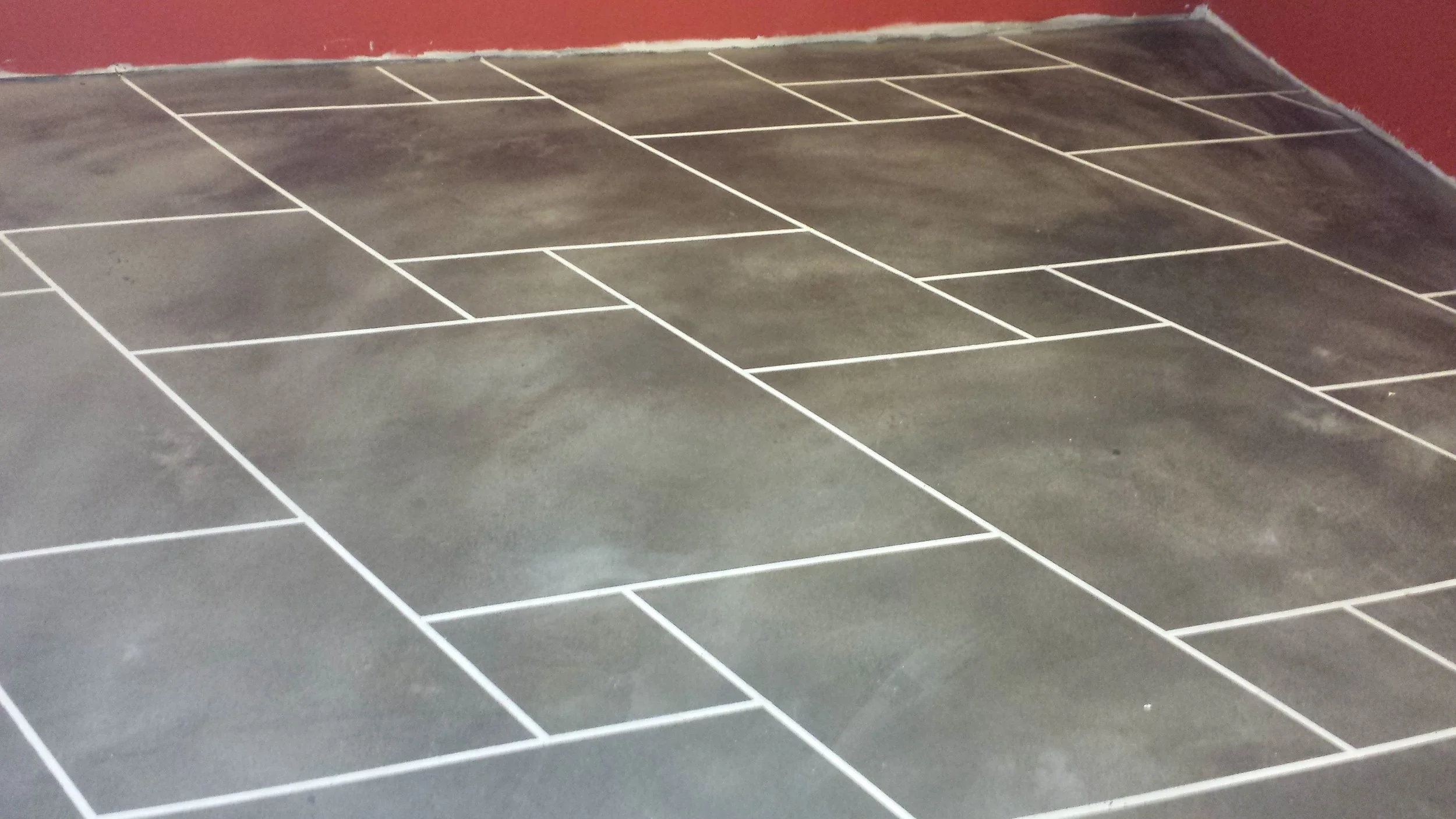 Our Elite Crete concrete flooring in our basement. Yes, that is a concrete product!