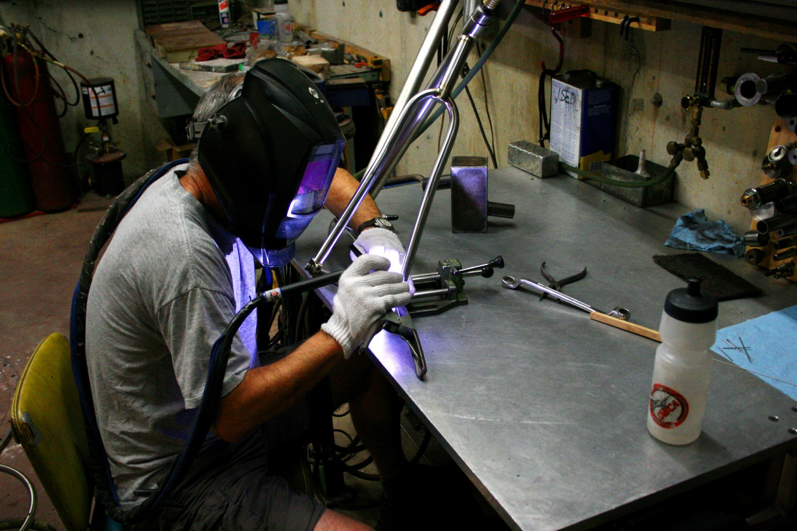 TCF-Shop-Framebuilding-Dave-Welding-Frame-Side.JPG