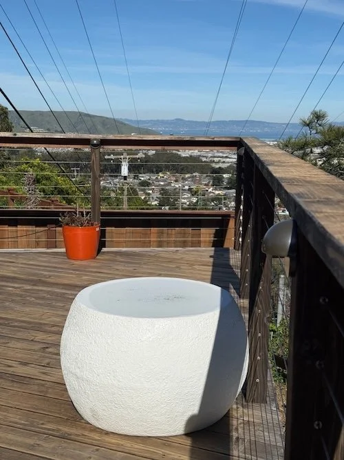 Post lights installed on patio railing with view over looking San Francisco Peninsula.