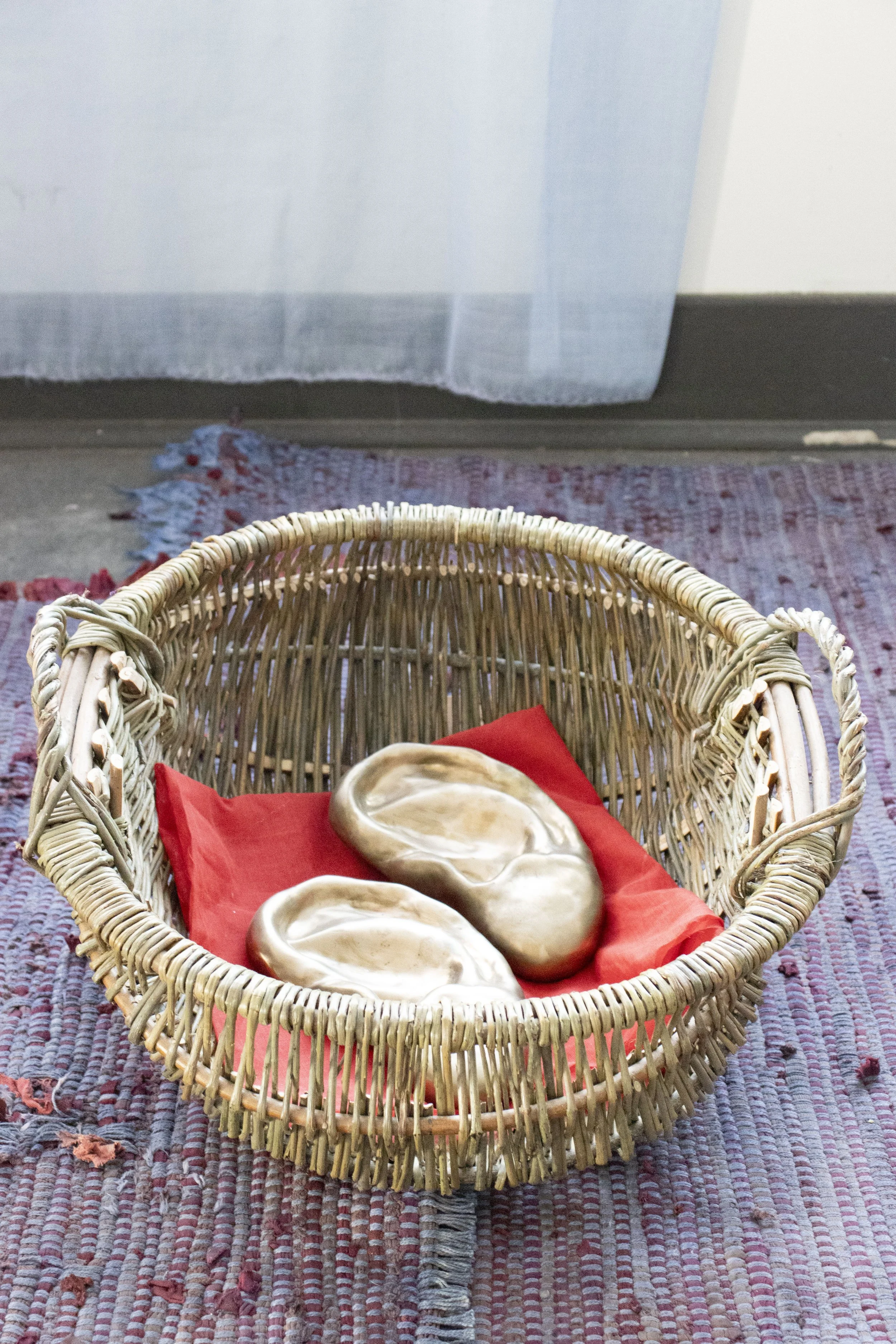  An Offering, 2026,   bronze, willow, cotton,   24” x 17” x 10”  photo by Alissa Touranachun 