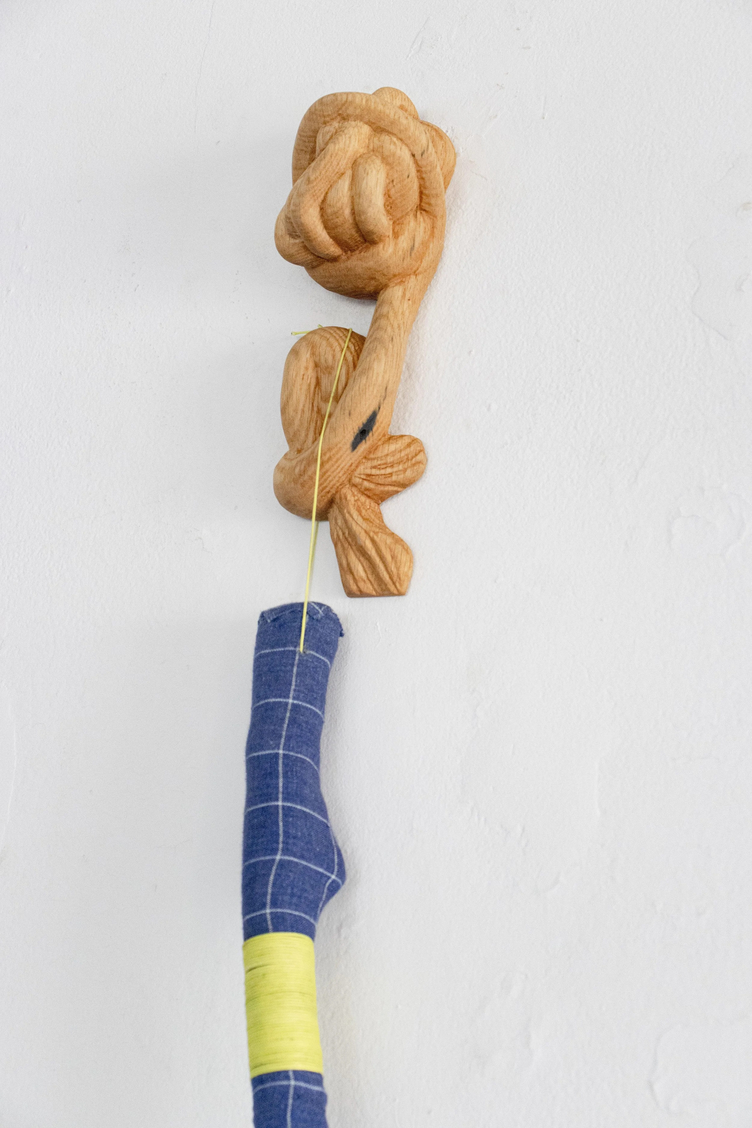  The Vehicle, 2026,   broomcorn, fabric, stick, oak,   14” x 5” x 80”  photo by Alissa Touranachun 