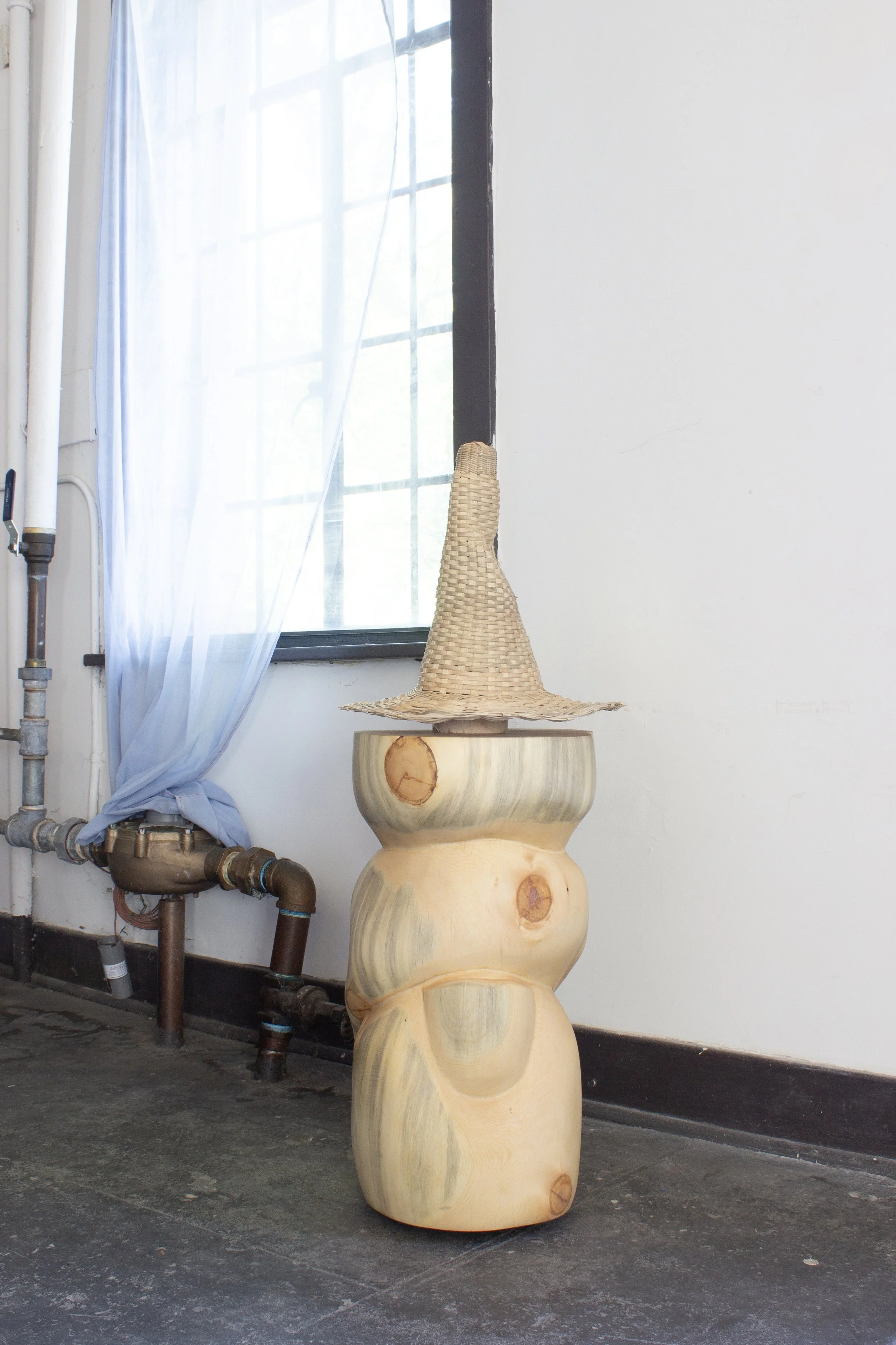  The Advisor, 2026,   wood, reed, tea stain,   44” x 16” x 16” 