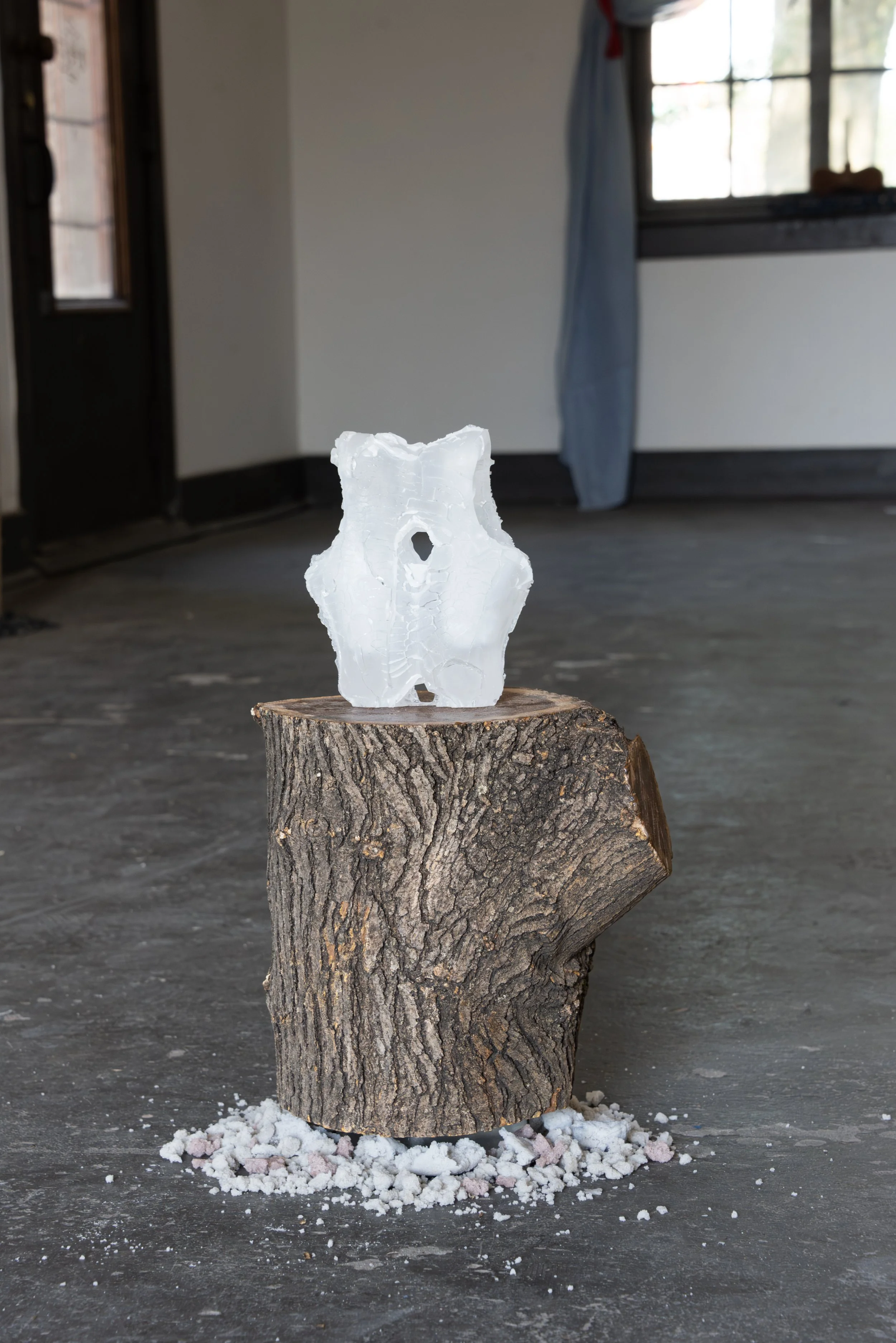  The Transformation, 2026,   cast glass, wood, cast stone,   15” x 15” x 22”  photo by Maria Burunderena 