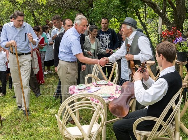 Prince Charles greeting the locals
