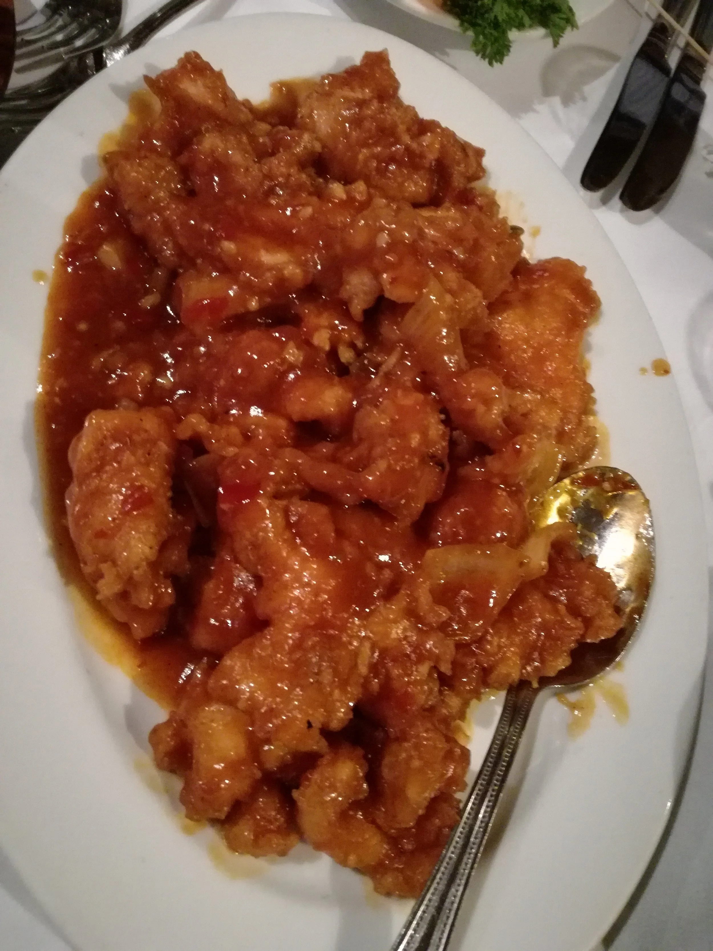 Tika Chicken...this is two portions by the way! Tika Hot Chicken - Tender Boneless Chicken seasoned with garlic, chives and minced garlic, deep fried and then finished with a delicious chili sauce. TT$108 per portion before Service Charge and VAT.